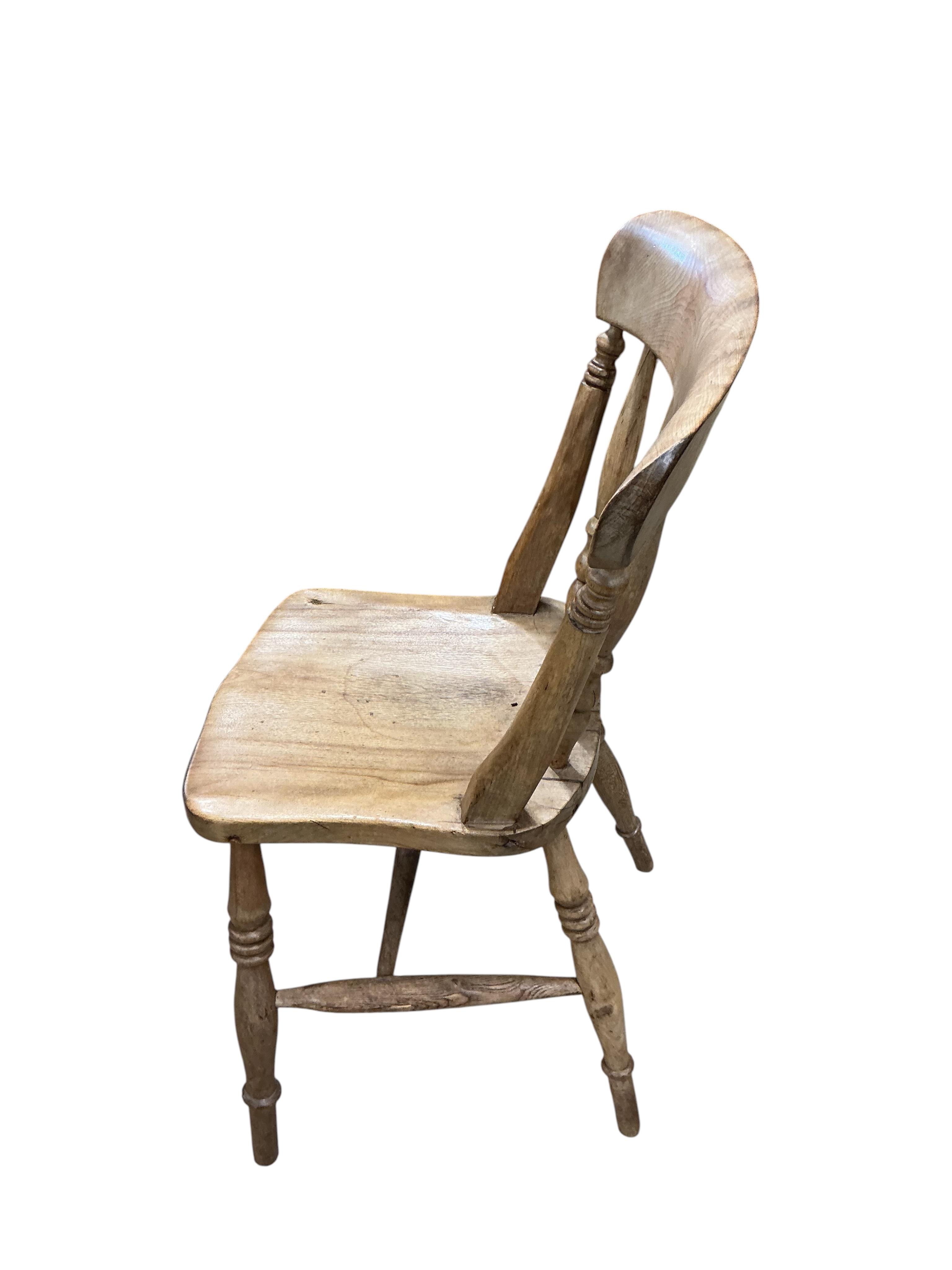 A set of six Victorian elm and beech Windsor kitchen chairs, width 45cm, depth 38cm, height 85cm
